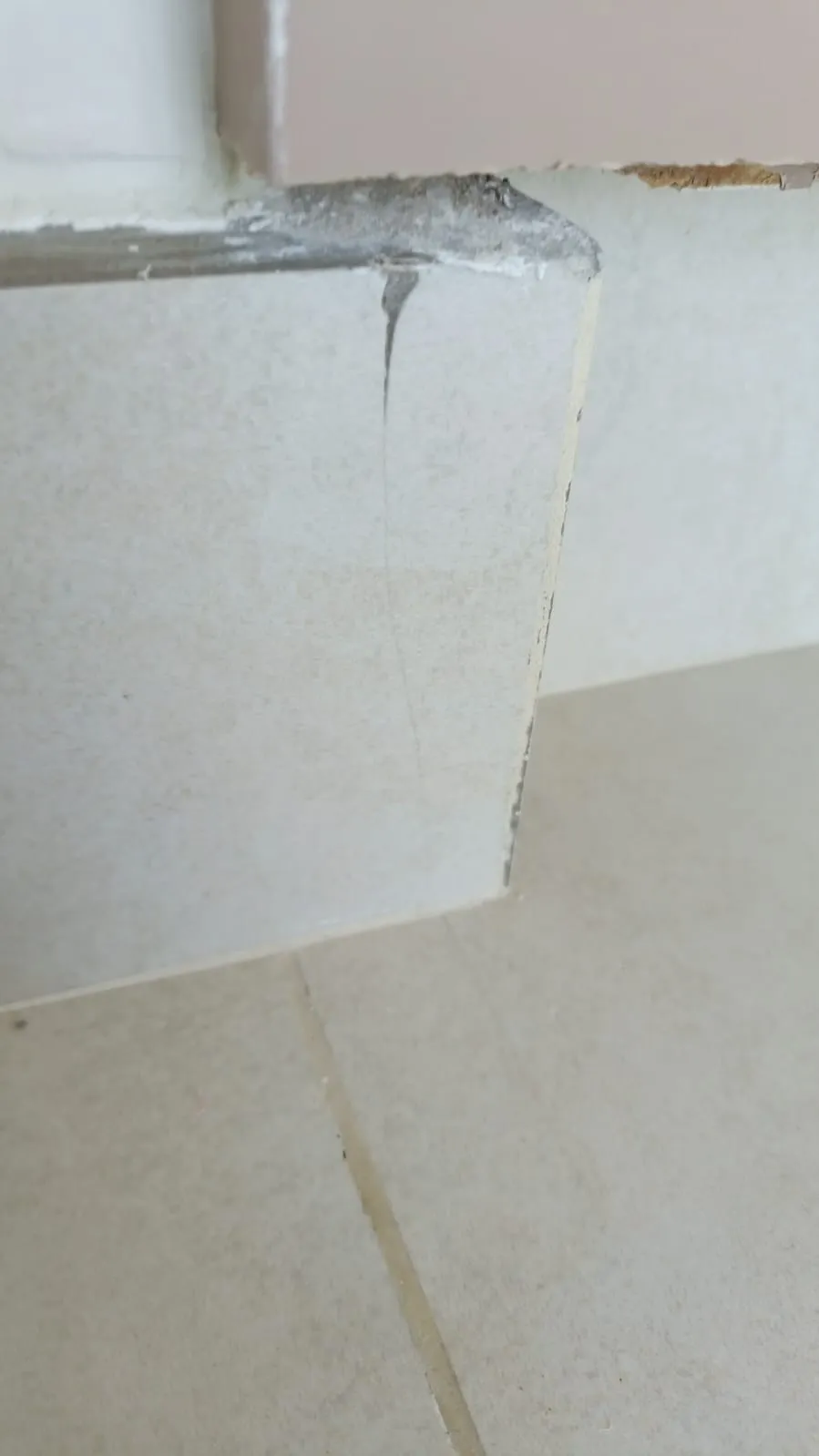 Cracked floor tile skirting found during professional snagging inspection in a Dubai new build property