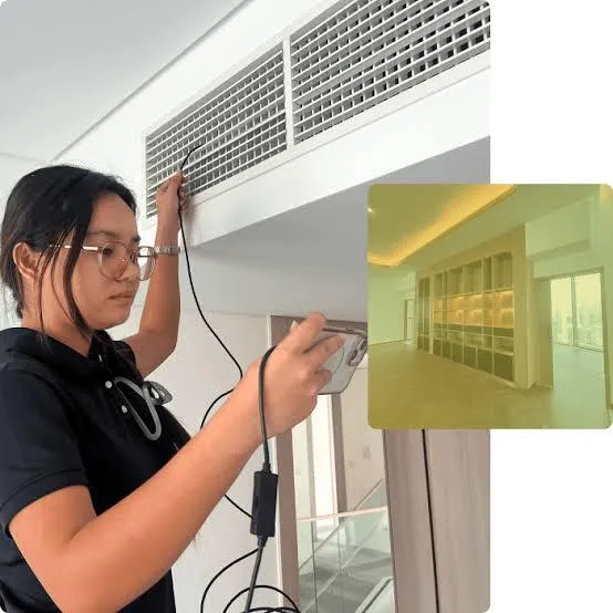 HVAC and mechanical systems inspection with airflow testing at an AC vent in Dubai