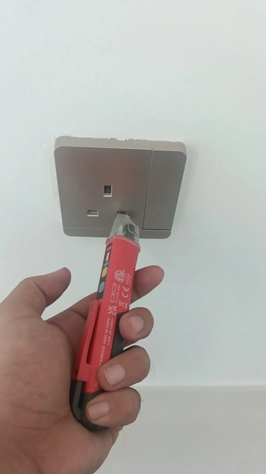 Faulty electrical socket found during snagging inspection at Arada, Sharjah